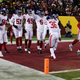Giants rookie Kayvon Thibodeaux celebrates with teammates after scoring TD in Sunday night’s win over Commanders.